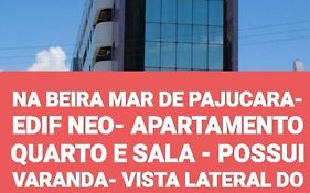 NA BEIRA MAR DE PAJUCARA- EDIF NEO- APARTAMENTO QUARTO E SALA - POSSUI VARANDA- VISTA LATERAL DO MAR-RUA JULIO PLECH FILHO 60 ESQUINA COM AVENIDA DOUTOR ANTONIO GOUVEIA - CONSUMO ELETRICO É PAGO No CKECK-OUT - 1 KWH É 1,35 REIAS
